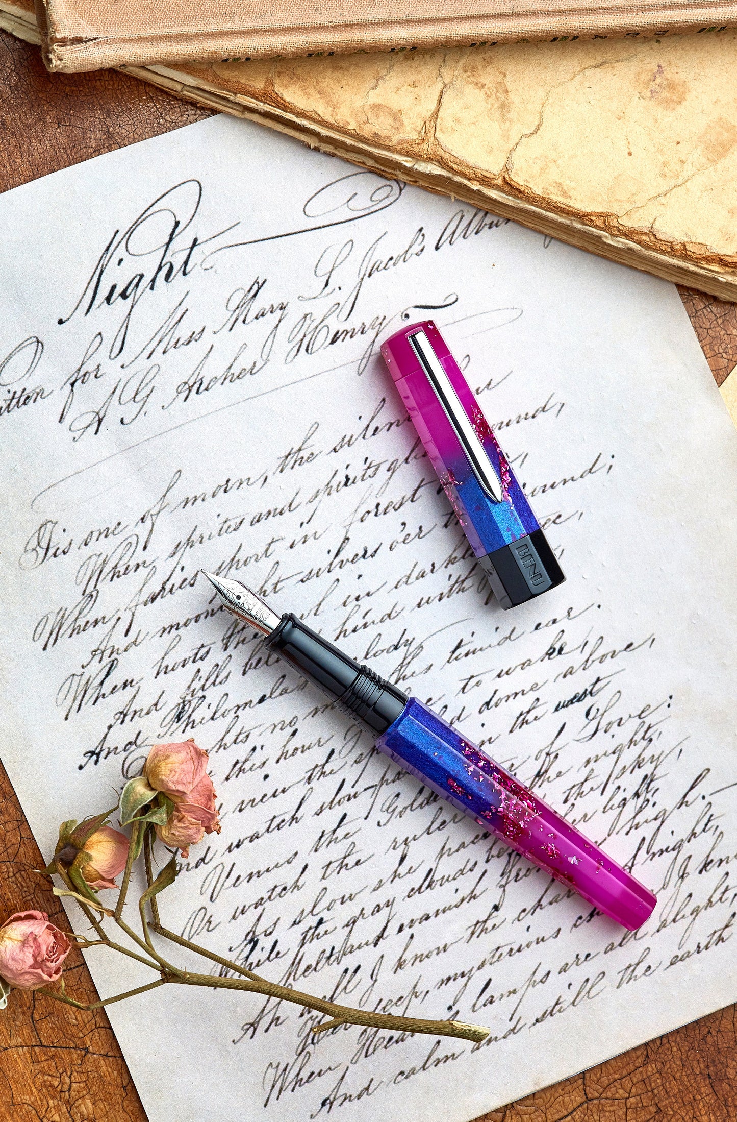 Fountain pen with a colorful design on an old letter