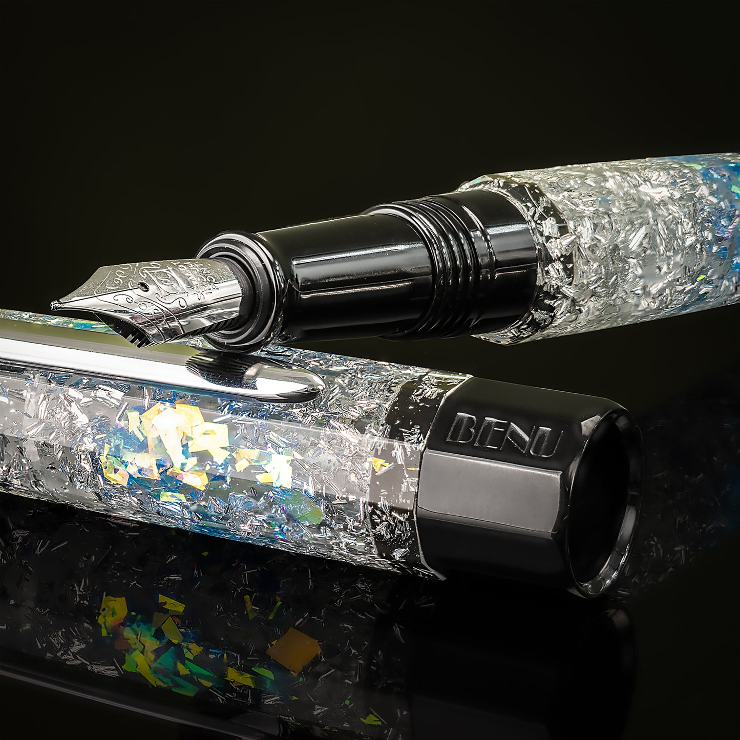 Fountain pen with decorative cap on a black background