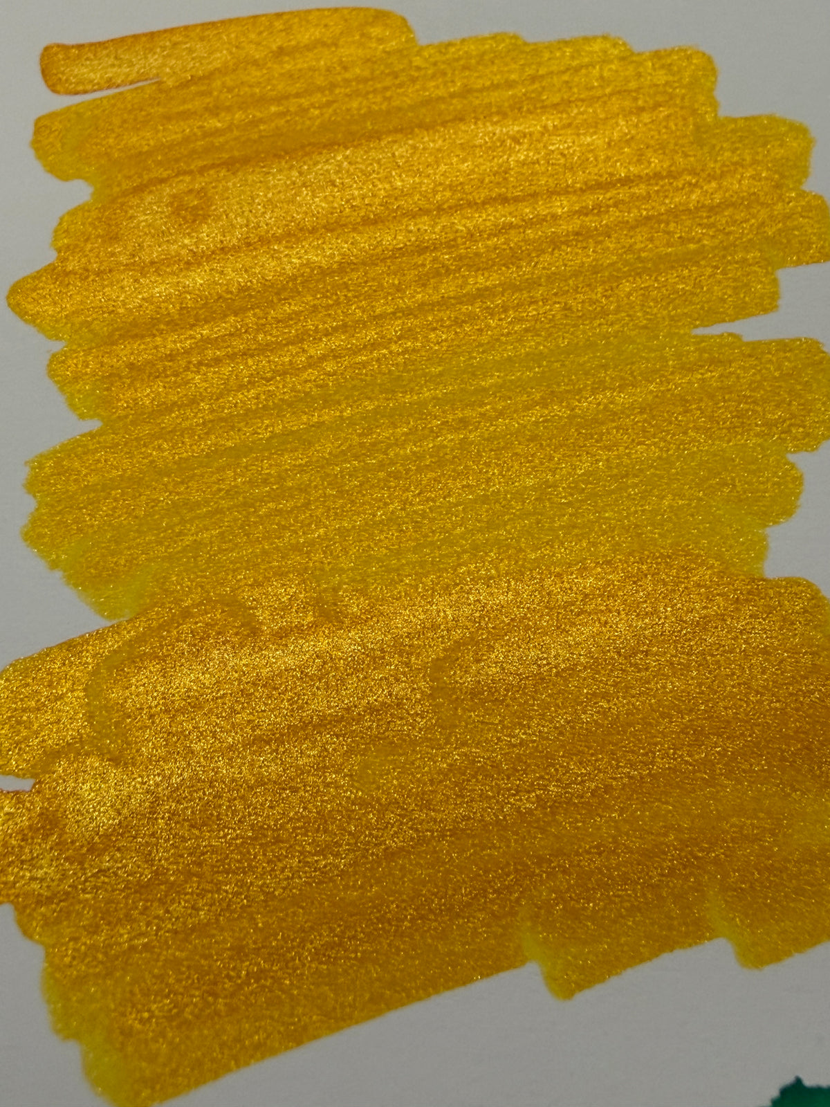 Octopus Celestial Glitter Helios' Glow: close-up of the ink swatch showing reflective shimmer.
