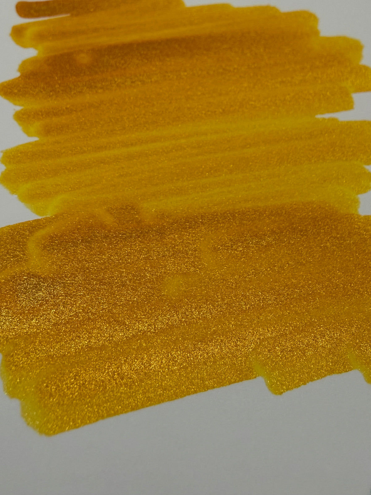 Octopus Celestial Glitter Helios' Glow: close-up of overlapping ink strokes showing shimmer.