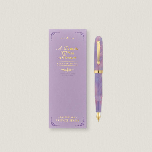 Wearingeul A Dream Within a Dream fountain pen beside its lavender book-style box